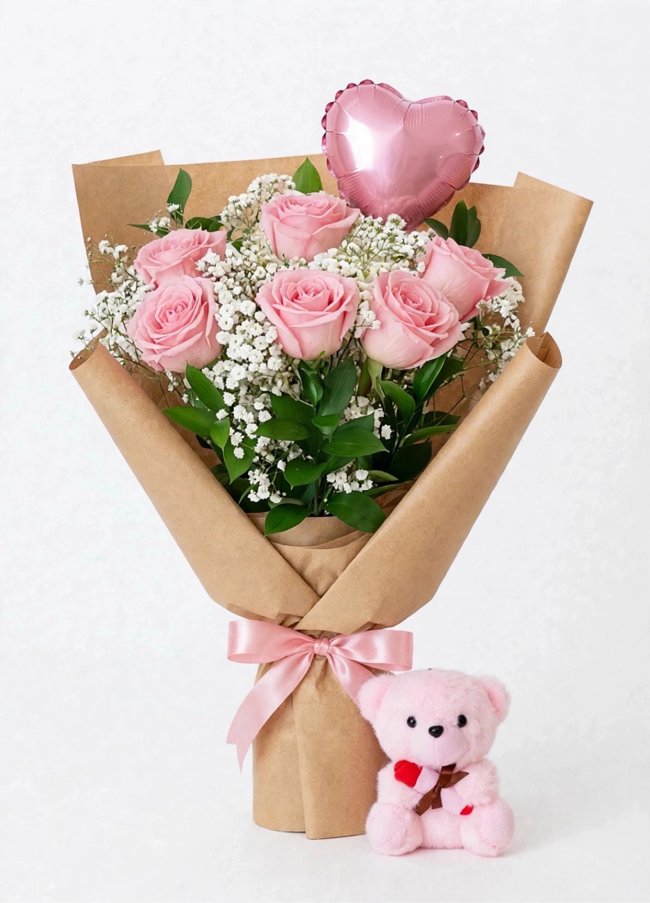 Pink Sweetheart Mini Balloon & Teddy Bear Bouquet — six pink roses in kraft wrap with a pink heart balloon and a pink teddy bear
